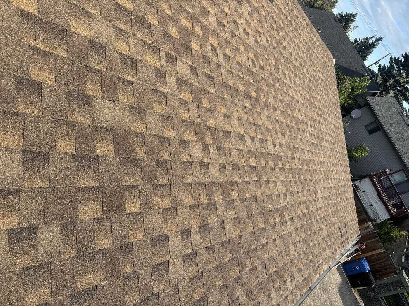 Completed architectural shingle roof on an NE Calgary home