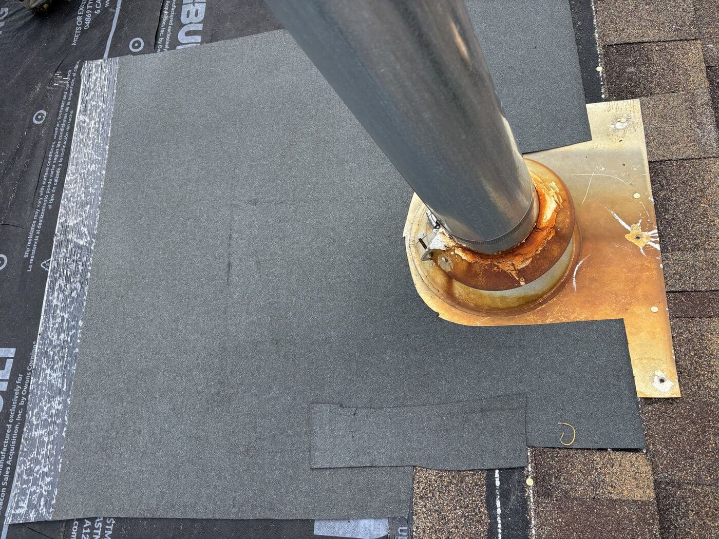 Worn asphalt shingle roof before replacement in NE Calgary
